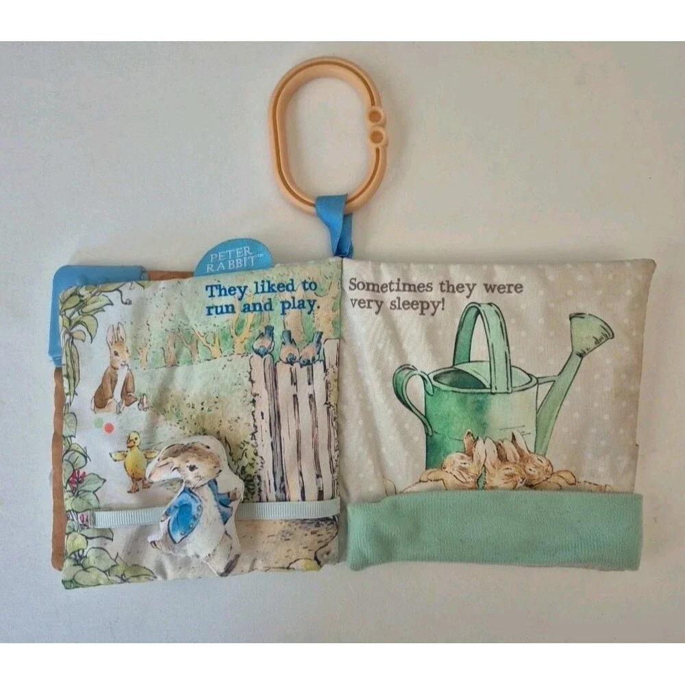 Peter Rabbit Soft Squeaky Baby Book with Silicone Teether & On the Go Clip